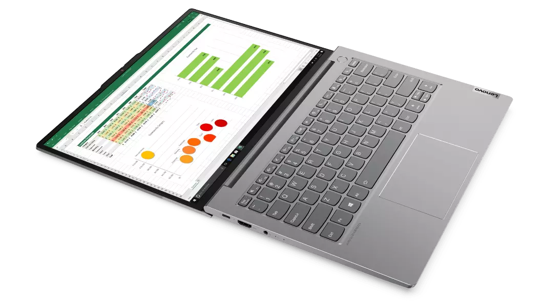 Lenovo ThinkBook 13s Gen 3 (13" AMD) laptop – top view with lid open flat and charts on screen.