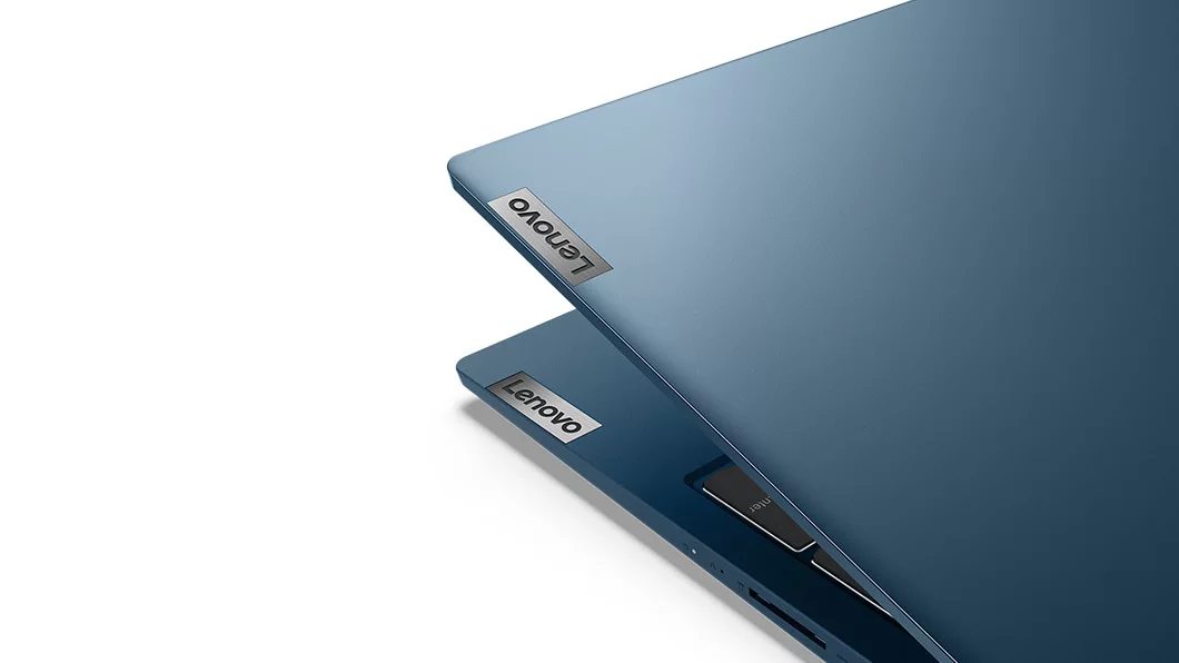 Closeup of a corner of the IdeaPad 5 (15) AMD laptop, light teal color
