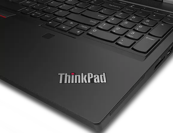 Detail of bottom right corner of keyboard on the Lenovo ThinkPad T15g showing ThinkPad logo and fingerprint reader.