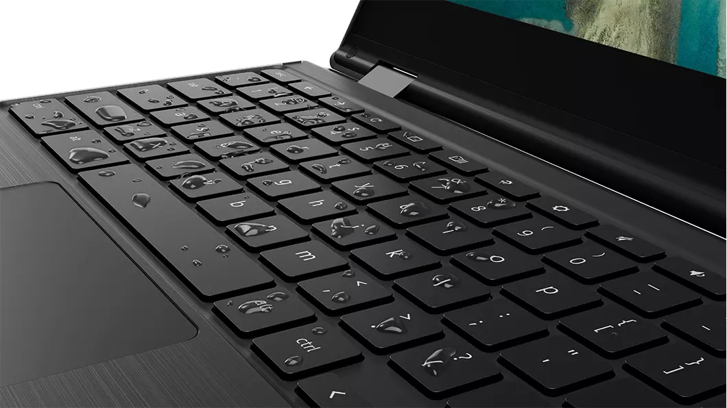 Closeup of the Lenovo 300e Chromebook 2nd Gen AST laptop with water on the keyboardt