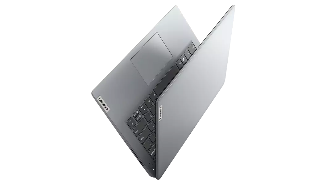 Imagen de la portátil Lenovo IdeaPad 1i 7ma Gen (14&quot;, Intel) con la pantalla semicerrada y apoyada en uno de sus bordes
