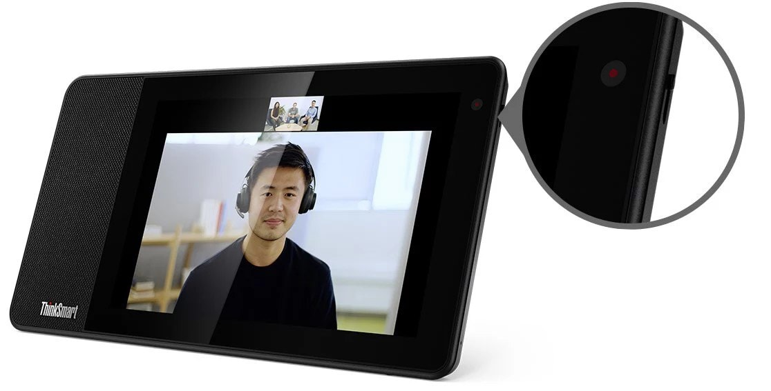ThinkSmart View for Zoom facing ¾ front-left with image of man in conference call on the display, plus bubble of close up of shutter.
